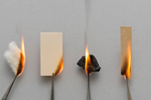 Smell and Burn Test demonstration with materials under controlled burning.